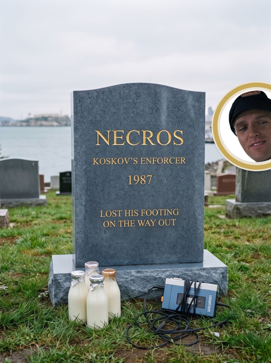 Necros headstone in blue-grey granite with gold lettering and porcelain portrait medallion of Andreas Wisniewski as Necros